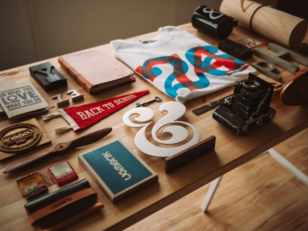 brand kits - black camera on top of brown desk
