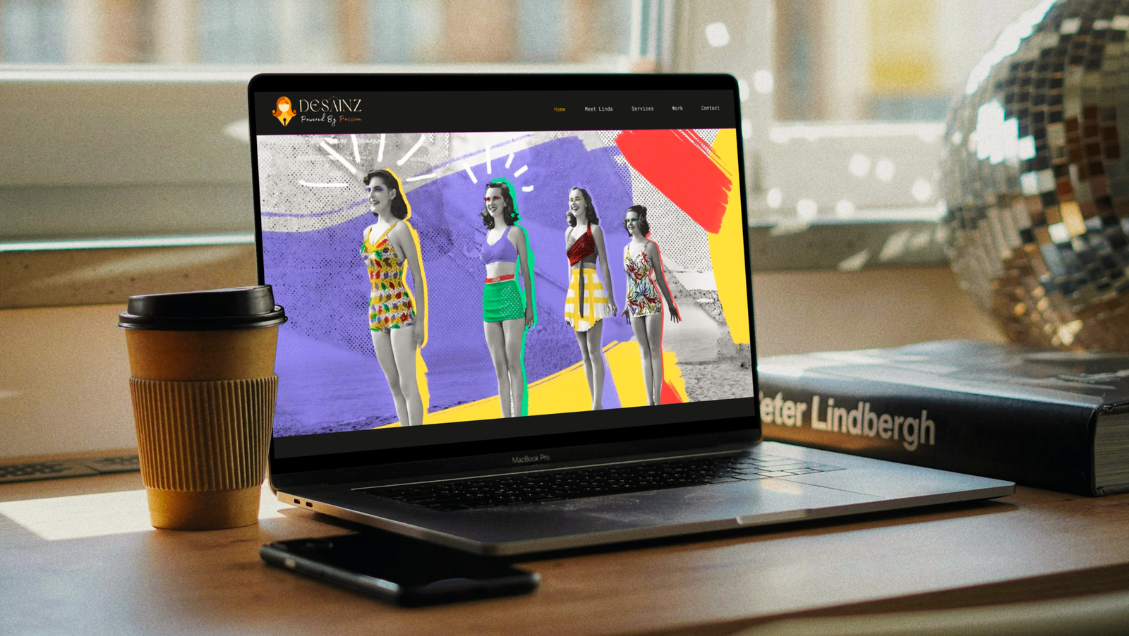 Laptop on the table displayed Graphic Design Services Calgary